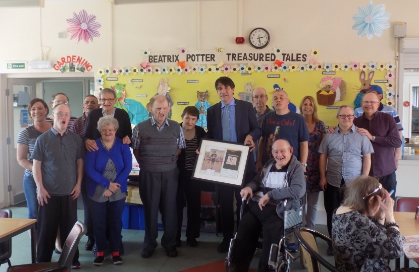 James Morris MP with staff and residents from Halas Homes