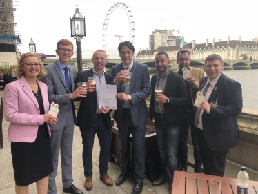 Cllr Ruth Buttery, Cllr Joe Roberts, Scott Povey, James Morris MP, Paul Williams, Jonathan Elliot and Cllr Simon Phipps on the Terrace of the Houses of Parliament