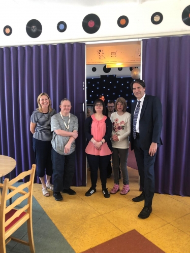 James Morris MP at Halas Homes looking at their new room divider 